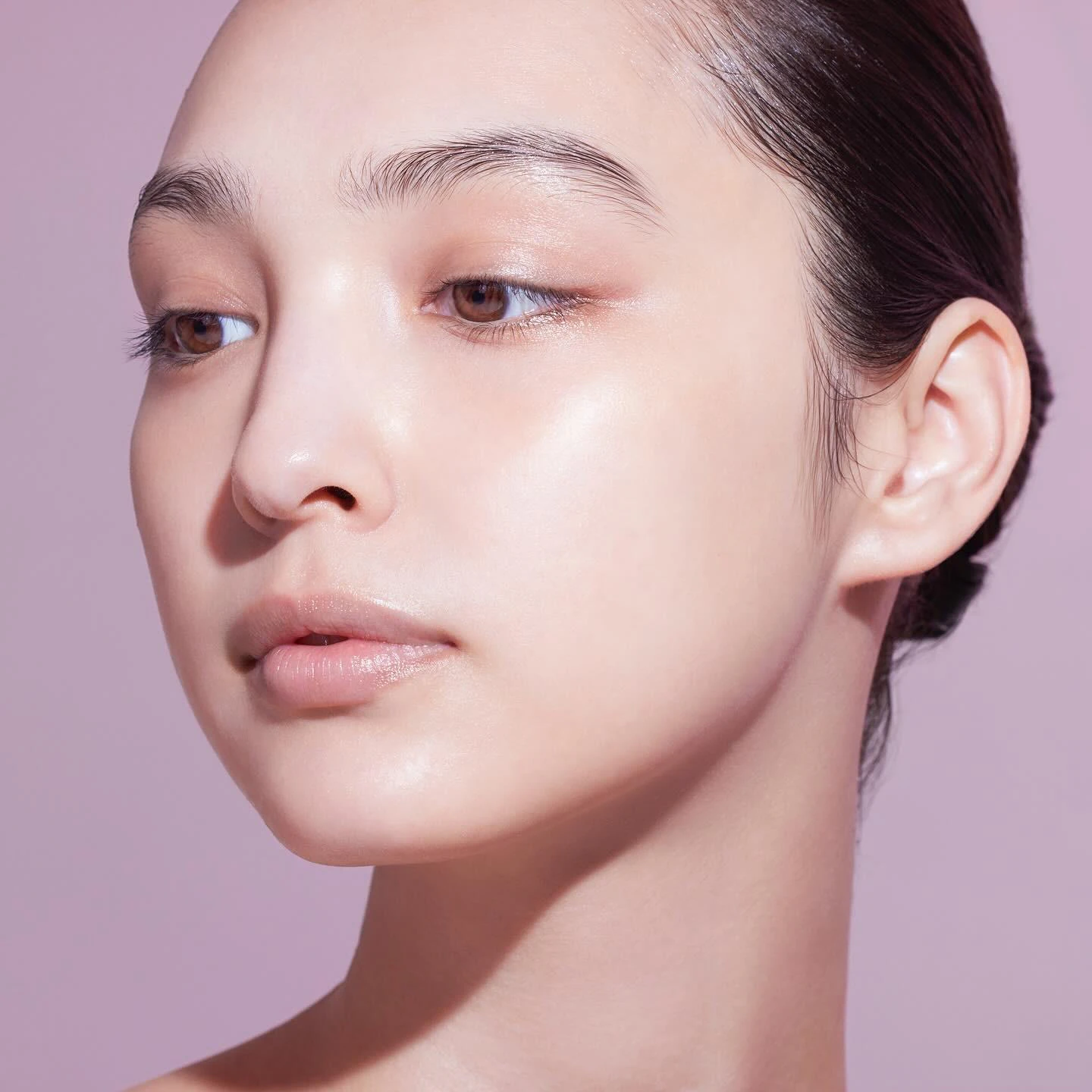 A model from the official AGTHEORY skincare campaign