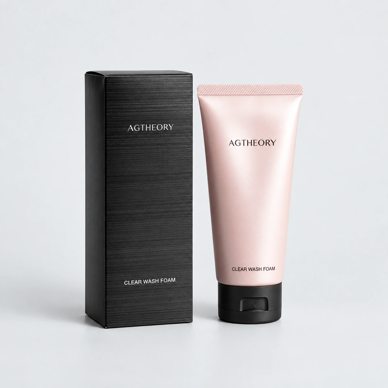 غسول الوجه الرغوي AGTHEORY Clear Wash Foam — 100 غ — product and original carton on a gray background