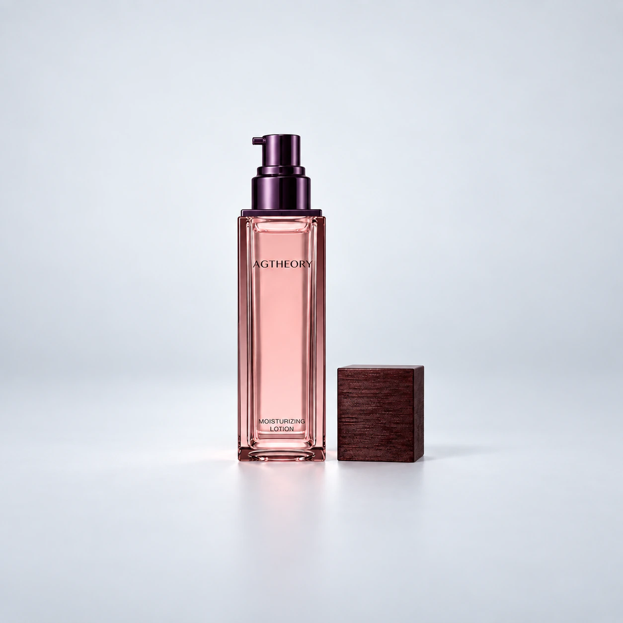 AGTHEORY Moisturizing Lotion 100mL — bottle with the pump exposed and cap beside it on a gray background