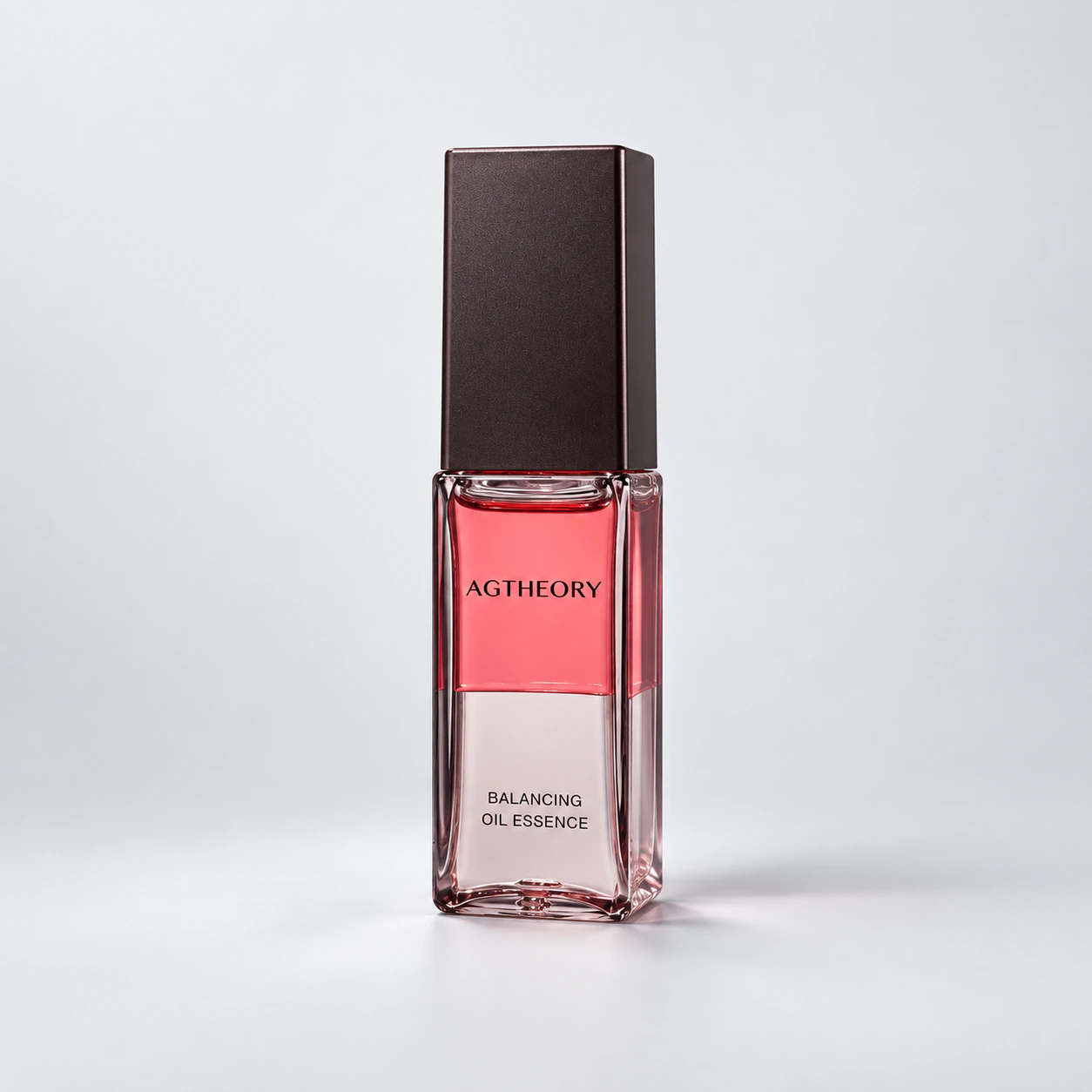 AGTHEORY Balancing Oil Essence 30mL — three-quarter bottle view on a gray background