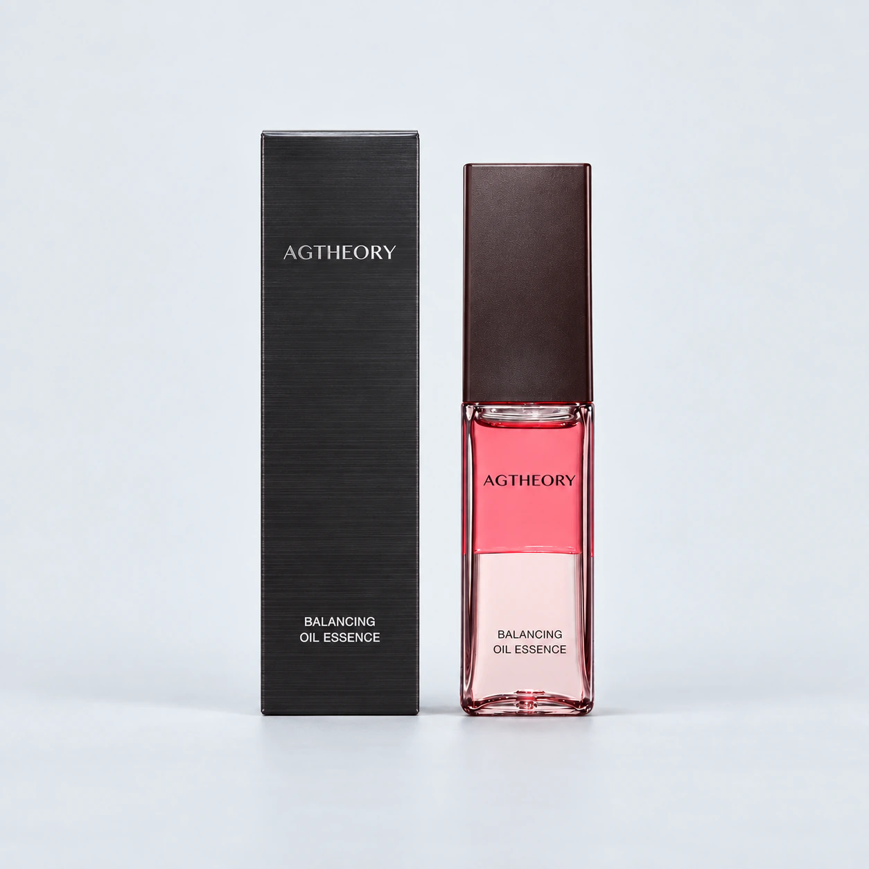 AGTHEORY Balancing Oil Essence 30mL with its retail carton on a gray background